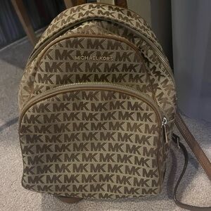 Selling this gently used MK mini backpack. In EUC